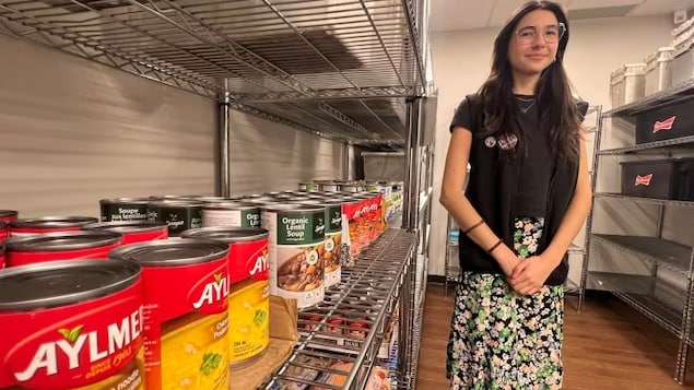 Bianca Gouveia is the vice-president of student services for the student council at Western University. She says student use of the USC's food bank has increased in recent years as students deal with higher rents and food prices. (Andrew Lupton/CBC)