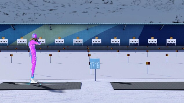 Une skieuse effectue un tir au fusil.
