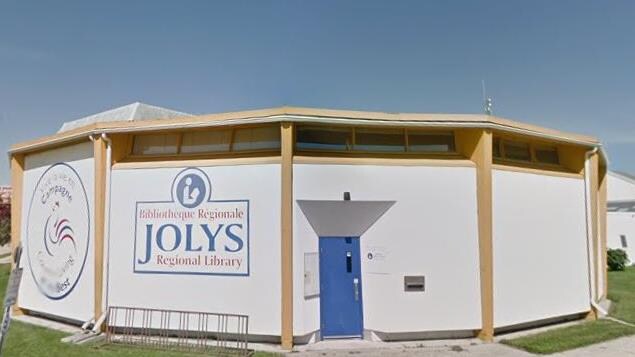 Un bâtiment sur lequel il est inscrit Bibliothèque Régionale Jolys