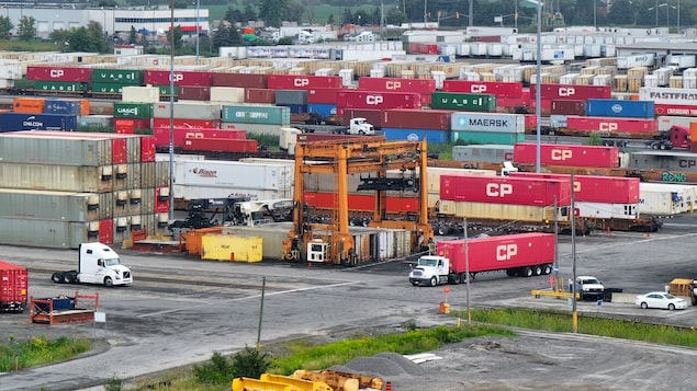 An aerial photo of trains and shipping containers at the CPKC Railway Yard in Vaughan, Ont. Canada's transportation and warehousing sector grew 1.4 per cent in February, a pace that StatsCan said was the largest monthly growth rate since January 2023. 