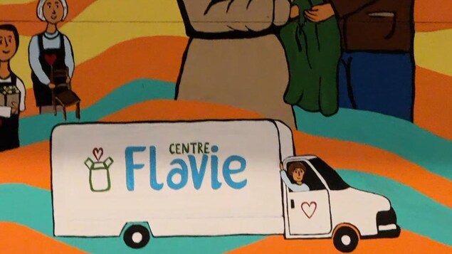 Une peinture sur le mur du Centre Flavie qui montre un camion. 