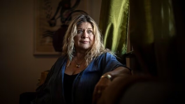 Gisselle Del Carmen Vivanco Leiva, pictured in her Burnaby home on Thursday, is one of nearly 7,000 Chileans who settled in Canada after a 1973 coup d'etat. (Ben Nelms/CBC)