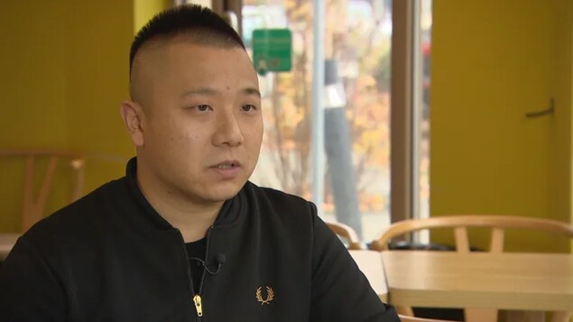 An Dong Pan, a Canadian permanent resident living in Richmond, says as a Realtor, he frequently works with clients who need to move sums of money from China to Canada. (Mike Zimmer/CBC)