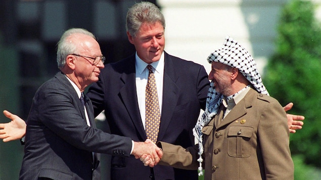 FILE - In this Sept. 13, 1993 file photo, U.S. President Clinton presides over White House ceremonies marking the signing of the peace accord between Israel and the Palestinians with Israeli Prime Minister Yitzhak Rabin, left, and Palestinian leader Yasser Arafat, right, in Washington. The most promising diplomatic effort between Palestinians and Israelis took place - much of it in secret - in Oslo, Norway between 1991 and 1993, which produced the Oslo Accords, the foundation of diplomacy there