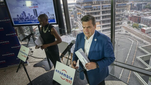 Denis Coderre et sa candidate Emilia Tamko en point de presse.