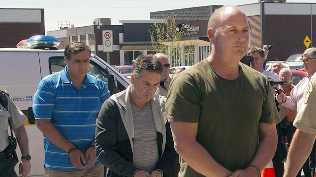 Tom Harding, Jean Demaitre, Richard Labrie au moment de leur arrestation. Tom Harding, Jean Demaitre, Richard Labrie au moment de leur arrestation.