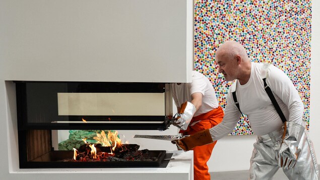 Damien Hirst burns his paintings in his London gallery