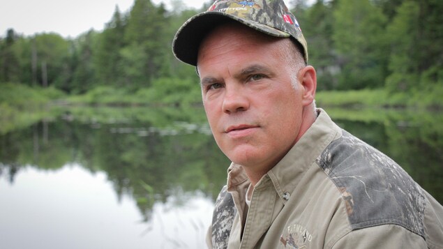 Dave MacLeod devant un lac Dave MacLeod devant un lac