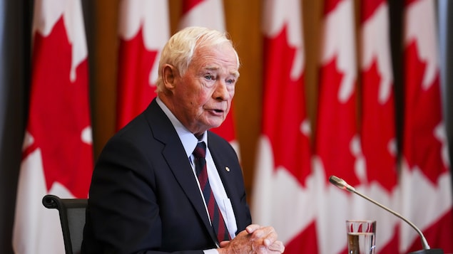 David Johnston, independent special rapporteur on foreign interference, waits to present his first report in Ottawa on Tuesday, May 23, 2023.