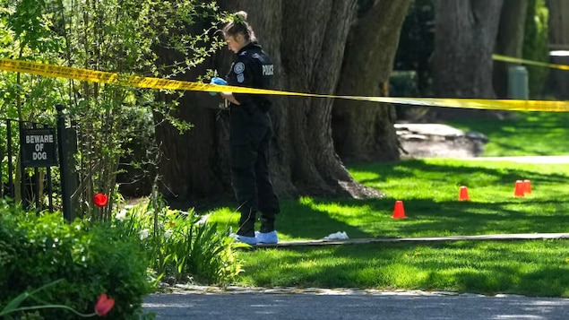 Toronto police at the scene of a shooting outside the gate of Drake's Toronto mega-mansion on May 7, 2024. 