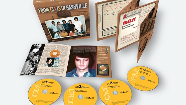 Photo représentant quatre disques et un coffret.