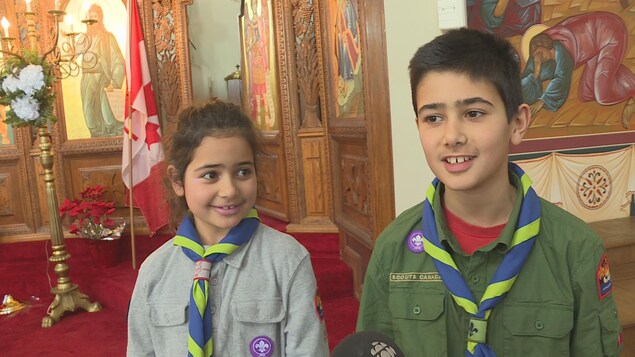Dalia Rassi, 8 ans et son frère Tarek, 11 sont devenus Scouts, dimanche. Dalia Rassi, 8 ans et son frère Tarek, 11 sont devenus Scouts, dimanche.