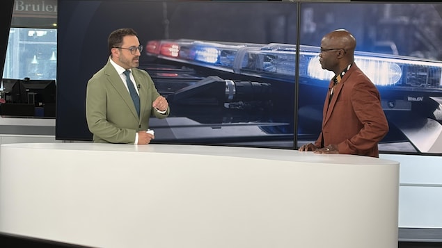 Louis-Simon Lapointe en discute avec Benoit Songa, directeur général au Centre R.I.R.E. 2000