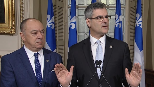 Christian Dubé et Éric Caire