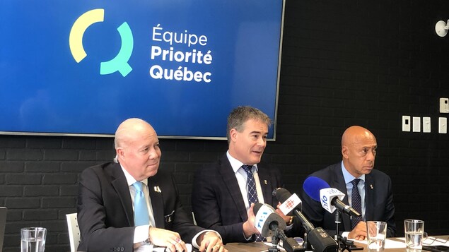 Éric Ralph Mercier, Patrick Paquet et Stevens Mélançon en conférence de presse.