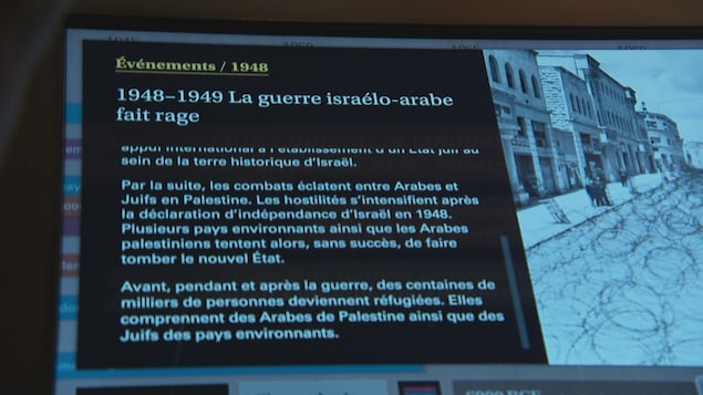 Un écran qui affiche 1948-1949 La guerre Israélo-arabe fait rage.