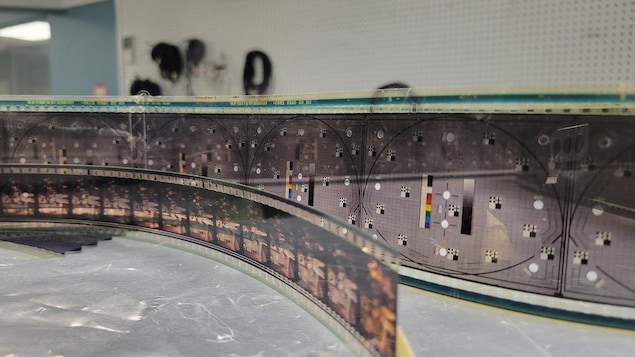 70mm and 35mm films on a cutting table.