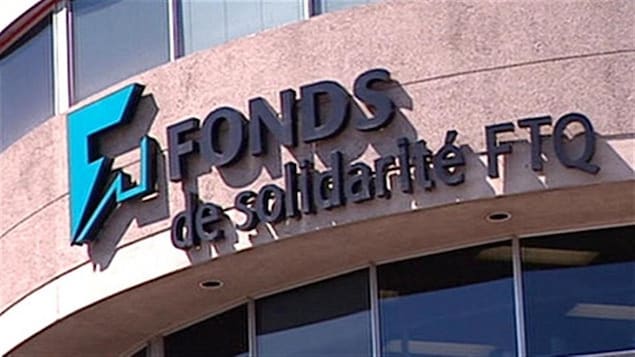 L'affiche du Fonds de solidarité FTQ sur un immeuble.