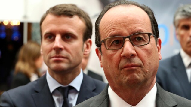 Le président français François Hollande en compagnie d'Emmanuel Macron