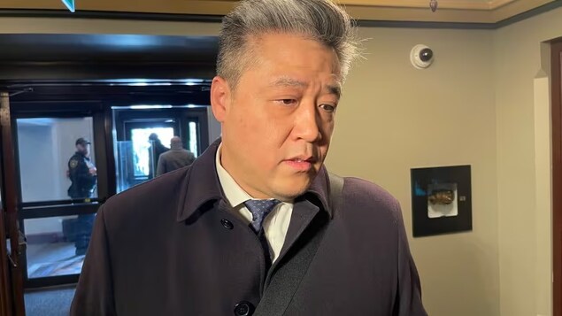 Liberal MP Han Dong speaks with reporters outside the House of Commons on Tuesday. (Chris Rands/CBC)