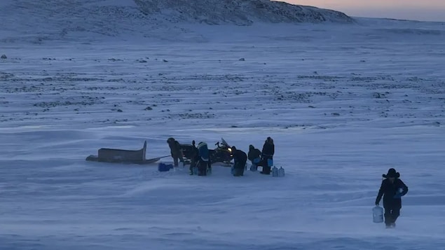Iqaluit residents gathered at the Sylvia Grinnell River on Friday to collect water. The territorial government confirmed on Saturday that there is fuel present in the city's water supply, but the fuel levels are below what Health Canada deems unsafe. 