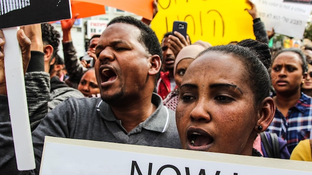 Des demandeurs d'asile et des Israéliens qui les appuient promettent de continuer à protester contre les plans du gouvernement, avant le début des déportations en mars. Des demandeurs d'asile et des Israéliens qui les appuient promettent de continuer à protester contre les plans du gouvernement, avant le début des déportations en mars.