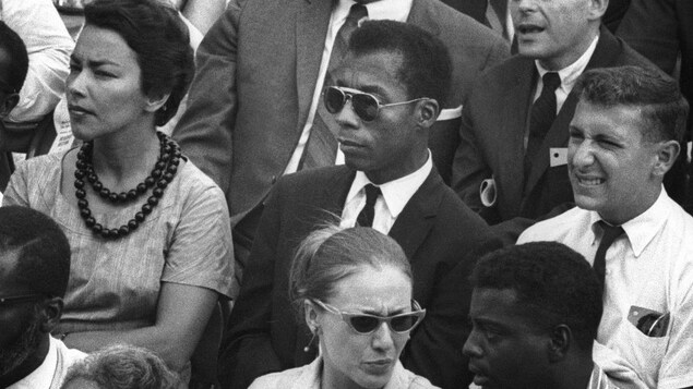 James Baldwin, au centre, dans le film « I Am Not Your Negro » James Baldwin, au centre, dans le film « I Am Not Your Negro »