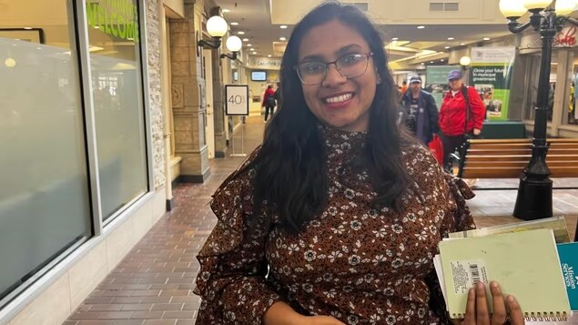 Lakshi Chandrathilak is looking for social work opportunities after she graduates from her college program in the summer. She says career fairs allow job seekers to have better in person interactions with employers. (Isha Bhargava/CBC )