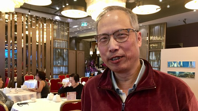 John Lao se tient debout dans un restaurant de Richmond. John Lao se tient debout dans un restaurant de Richmond.