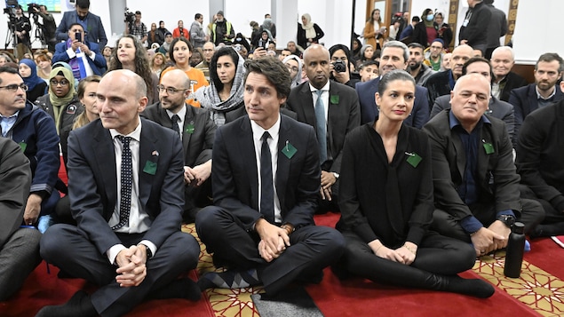 Politicians attend a ceremony marking the sixth anniversary of the deadly mosque shooting, Sunday, January 29, 2023  at the mosque in Quebec City. From the left, Health Minister Jean-Yves Duclos, Prime Minister Justin Trudeau, Quebec Deputy premier and Transport Minister Genevieve Guilbault and Quebec Minister Responsible for Infrastructure Jonathan Julien. THE CANADIAN PRESS/Jacques Boissinot