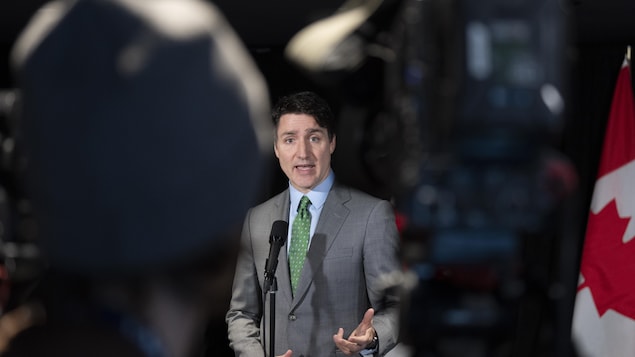 Justin Trudeau speaks to journalists.