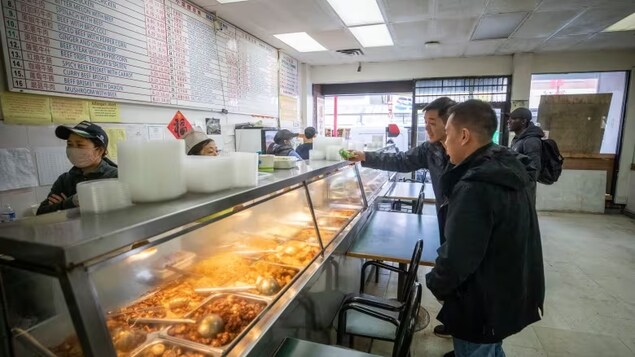 Customers are pictured at Kent’s Kitchen in the Chinatown neighbourhood of Vancouver, B.C., on Tuesday, March 14, 2023. (Ben Nelms/CBC)