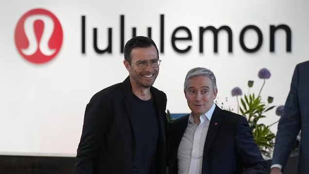 Lululemon CEO Calvin McDonald, left, and Minister of Innovation, Science and Industry Francois-Philippe Champagne at a news conference at the company's headquarters in Vancouver on Thursday.