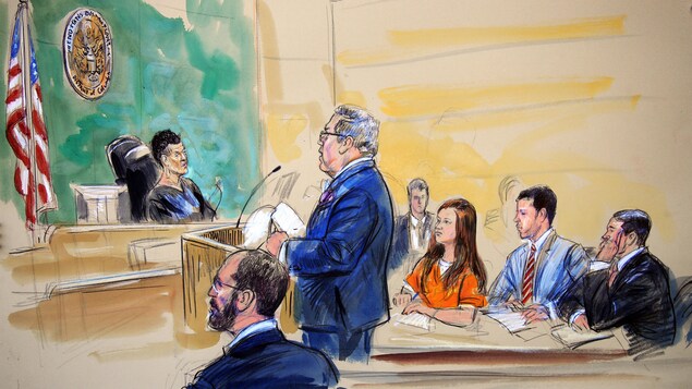 Ce croquis de cour représente Maria Boutina, en costume orange, écoutant son avocat Robert Driscoll lors d'une audience devant la cour fédérale à Washington, le mercredi 18 juillet 2018. Ce croquis de cour représente Maria Boutina, en costume orange, écoutant son avocat Robert Driscoll lors d'une audience devant la cour fédérale à Washington, le mercredi 18 juillet 2018.