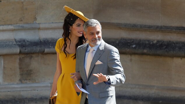 L'acteur George Clooney et sa femme Amal à leur arrivée au mariage du prince Harry et de Meghan Markle L'acteur George Clooney et sa femme Amal à leur arrivée au mariage du prince Harry et de Meghan Markle