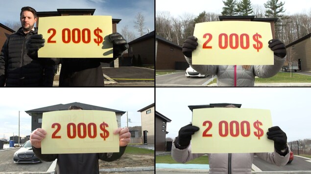 Quatre propriétaires tiennent une pancarte sur laquelle on peut voir « 2000$ ». Quatre propriétaires tiennent une pancarte sur laquelle on peut voir « 2000$ ».