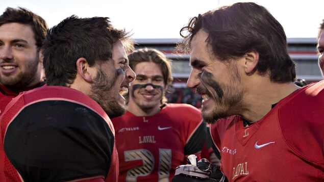 Laval University Rouge et Or game MVP Maxime Boutin, left, is congratulated by team mate Jean-Philippe Bolduc as F?lix Faubert-Lussier, centre, looks on after winning over Acadia Axemen at the CIS Uteck Bowl Saturday, November 17, 2012 in Quebec City. THE CANADIAN PRESS/Jacques Boissinot Laval University Rouge et Or game MVP Maxime Boutin, left, is congratulated by team mate Jean-Philippe Bolduc as F?lix Faubert-Lussier, centre, looks on after winning over Acadia Axemen at the CIS Uteck Bowl Saturday, November 17, 2012 in Quebec City. THE CANADIAN PRESS/Jacques Boissinot