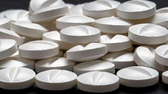 Des pilules blanches. Des pilules blanches.