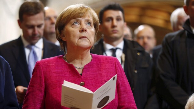 La chancelière allemande Angela Merkel à l'office commémorant le 500e anniversaire de la Réforme. La chancelière allemande Angela Merkel à l'office commémorant le 500e anniversaire de la Réforme.