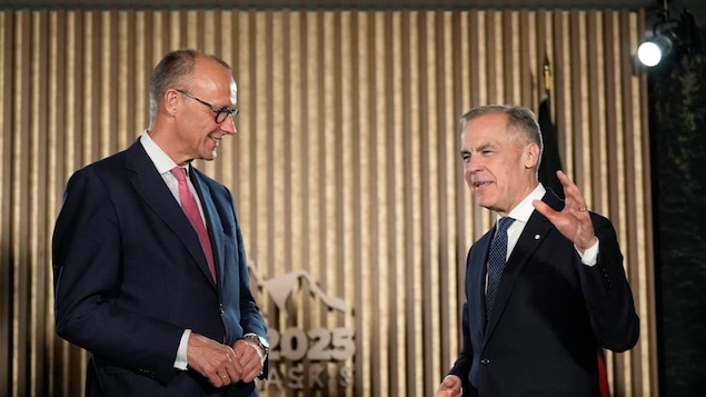Friedrich Merz and Mark Carney.
