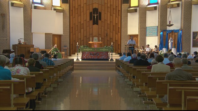 Une messe du dimanche à l'église Christ-Roi de Moncton, au Nouveau-Brunswick. Une messe du dimanche à l'église Christ-Roi de Moncton, au Nouveau-Brunswick.