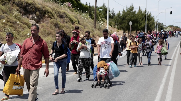 Des demandeurs d'asile sur l’île de Lesbos, en Grèce Des demandeurs d'asile sur l’île de Lesbos, en Grèce