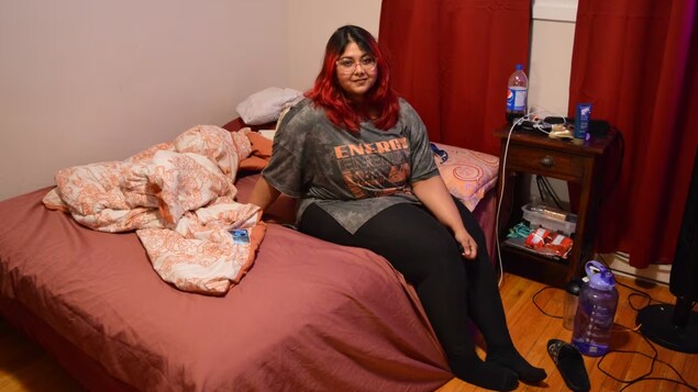 Mika Purni lives in a two-bedroom rental with her sister, amid what she calls the results of a 'scarcity mindset,' which compels her to collect clothing and food in the hopes of saving money down the line. 