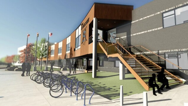 Un escalier extérieur mène à la bibliothèque.