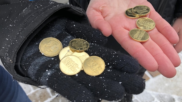 Des jetons de la monnaie ultra-locale Entrai-dons