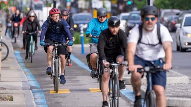 Quebec’s SAAQ teaching the ’Dutch reach’ to protect cyclists from ...