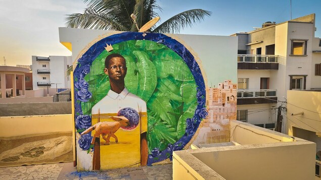 Une murale représentant l'artiste Karim Ouellet peinte à Dakar, au Sénégal. 