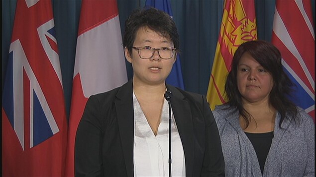 Nayoung Kim, de l'association Les femmes asiatiques pour l'égalité, pendant la conférence de presse à Ottawa. Nayoung Kim, de l'association Les femmes asiatiques pour l'égalité, pendant la conférence de presse à Ottawa.