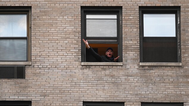 New York, New York carols at the window honoring caregivers |  Coronavirus