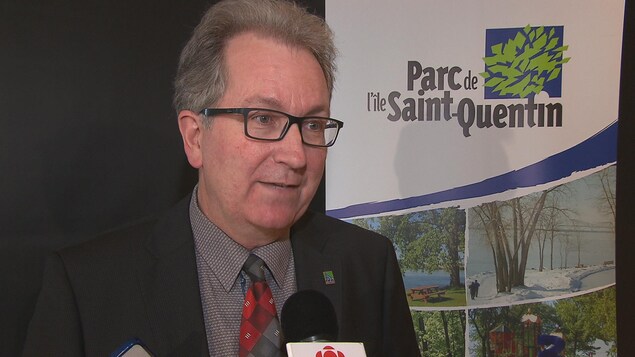 Capture d'écran du président de la Corporation pour le développement de l'île Saint-Quentin, André Noël Capture d'écran du président de la Corporation pour le développement de l'île Saint-Quentin, André Noël